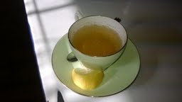 lemon sage tea with window shadow